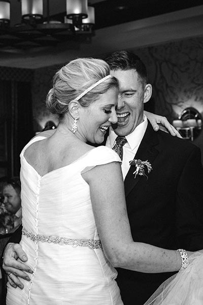 bride and groom dancing at wedding reception