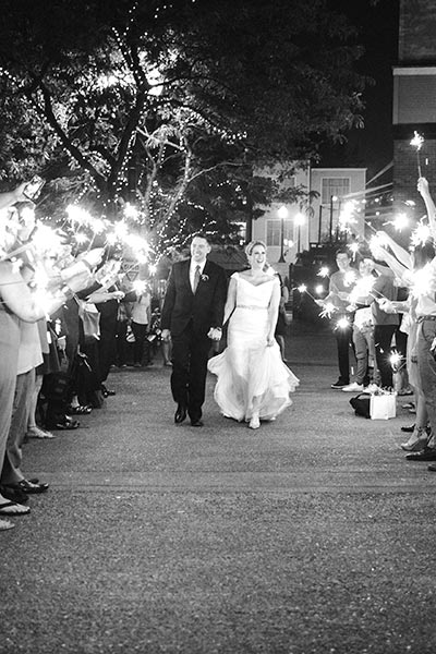 bride and groom walking down the aisle at wedding ceremony
