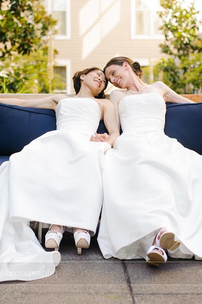 brides sitting on a bench